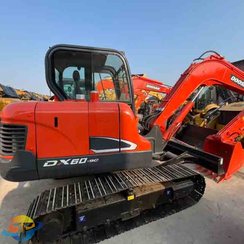 Used Doosan DX60-9C hydraulic mini excavator, suitable for small industrial projects. High quality, available for sale.