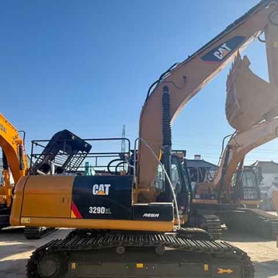 Used original Caterpillar 329D2L excavators, large construction equipment, are available for immediate sale.