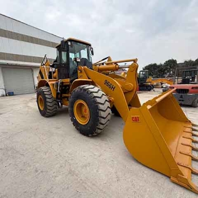 The Caterpillar CAT966H loader is in good condition, has strong power, and is available for immediate sale.