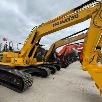 Used Komatsu PC220 excavator, original Japanese heavy mining and earthmoving machinery, for sale.